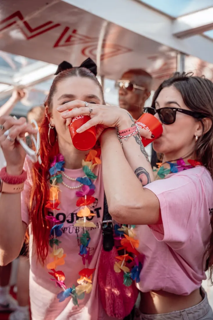 Friends drinking together on the Porto Party Boat